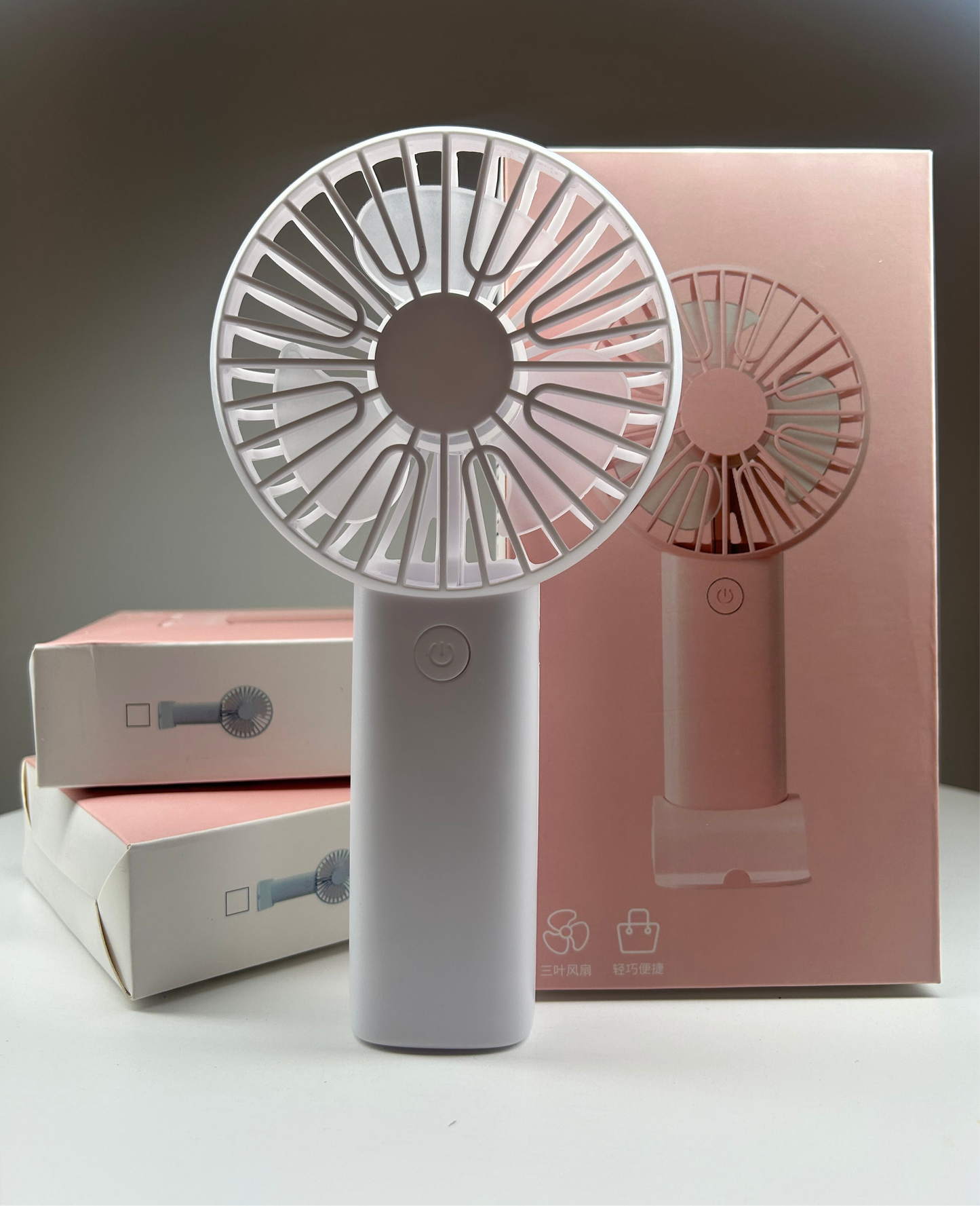 Small hand-held Fan